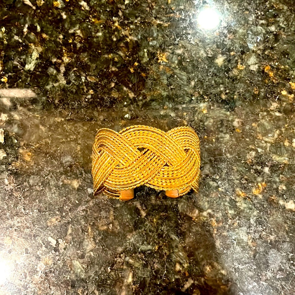 Large gold costume jewelry cuff bracelet.